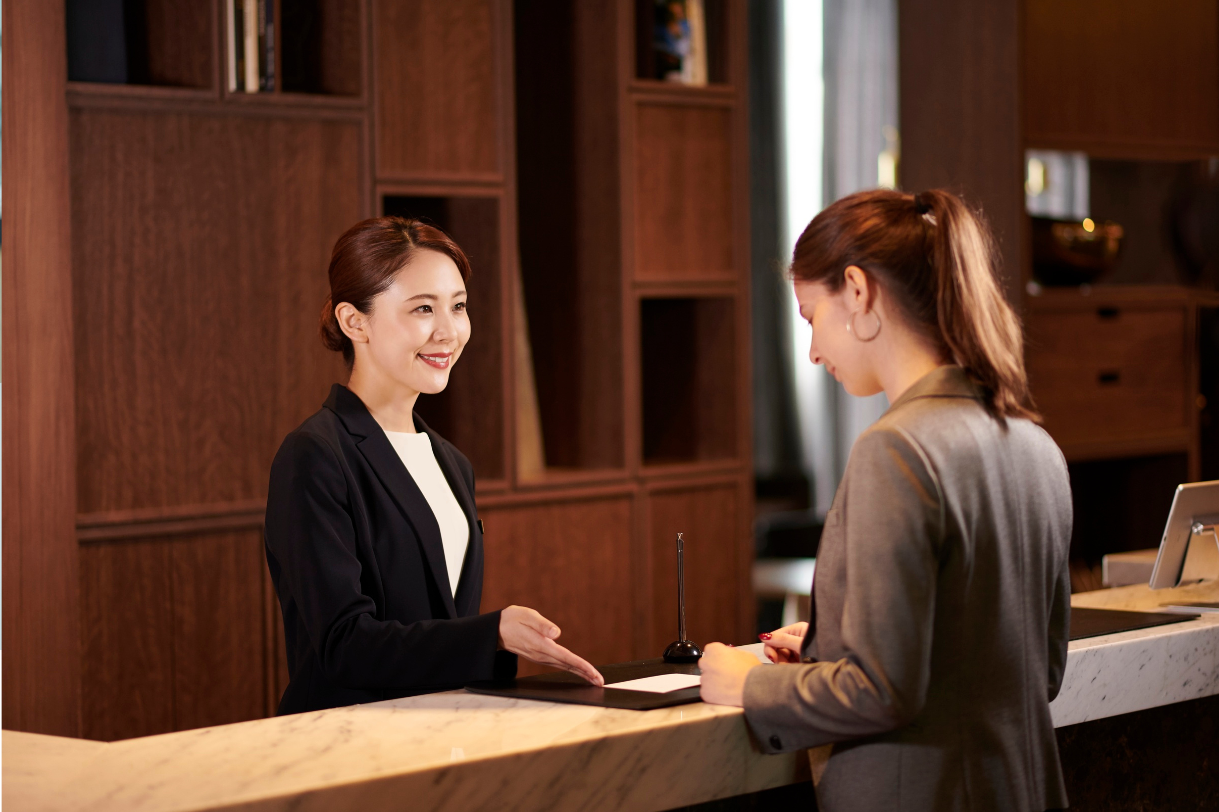 Participants learning mixology skills in a creative team development activity